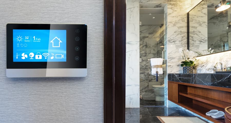 Smart home control panel on wall near bathroom